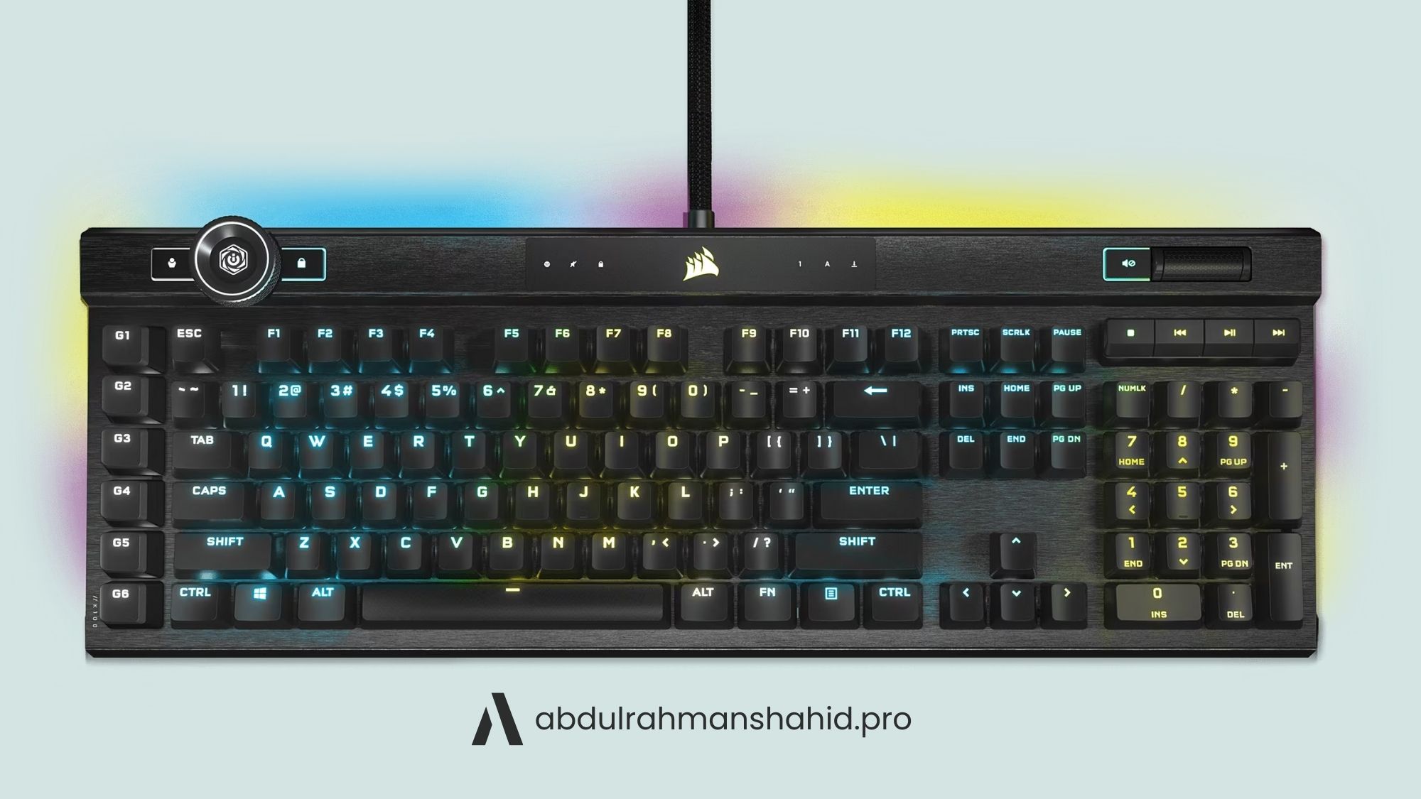 Corsair K100 RGB mechanical gaming keyboard, angled view showing per-key RGB lighting, dedicated macro keys, and a premium metal frame.